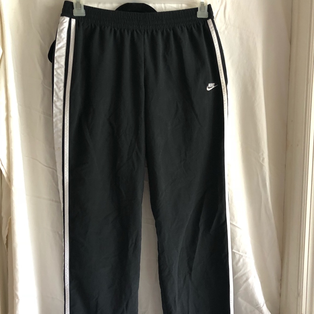 Nike warm up pants size small.